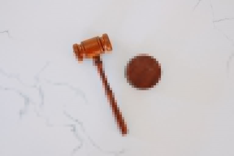 Gavel on marble counter