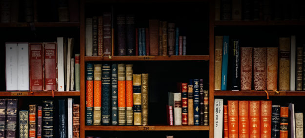 A bookshelf with a variety of legal books